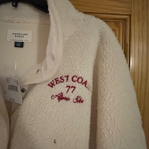 American Eagle Cream Fleece Pullover with Red Embroidery Sz Large, NWT! - Picture 2 of 3